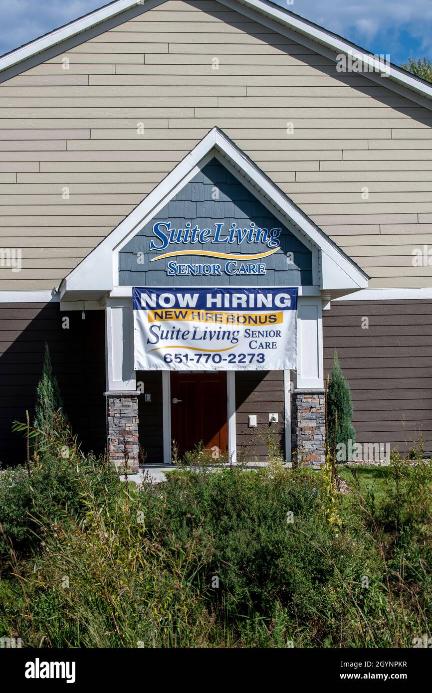 Vadnais Heights, Minnesota.  Now hiring sign at a senior care center with a hiring bonus. Stock Photo