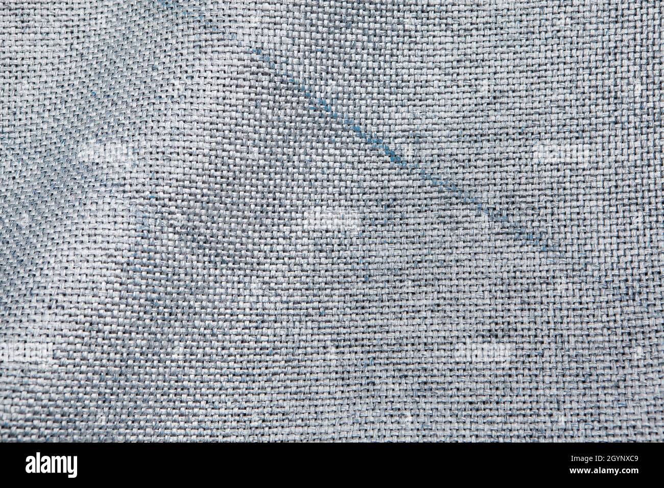Detail of the Arc de Triomphe wrapped in silver-blue fabric in the Place Charles de Gaulle in Paris, France. The Arc de Triomphe was wrapped for two weeks being converted to an artwork as it was designed by Christo and Jeanne-Claude in September 2021. Stock Photo