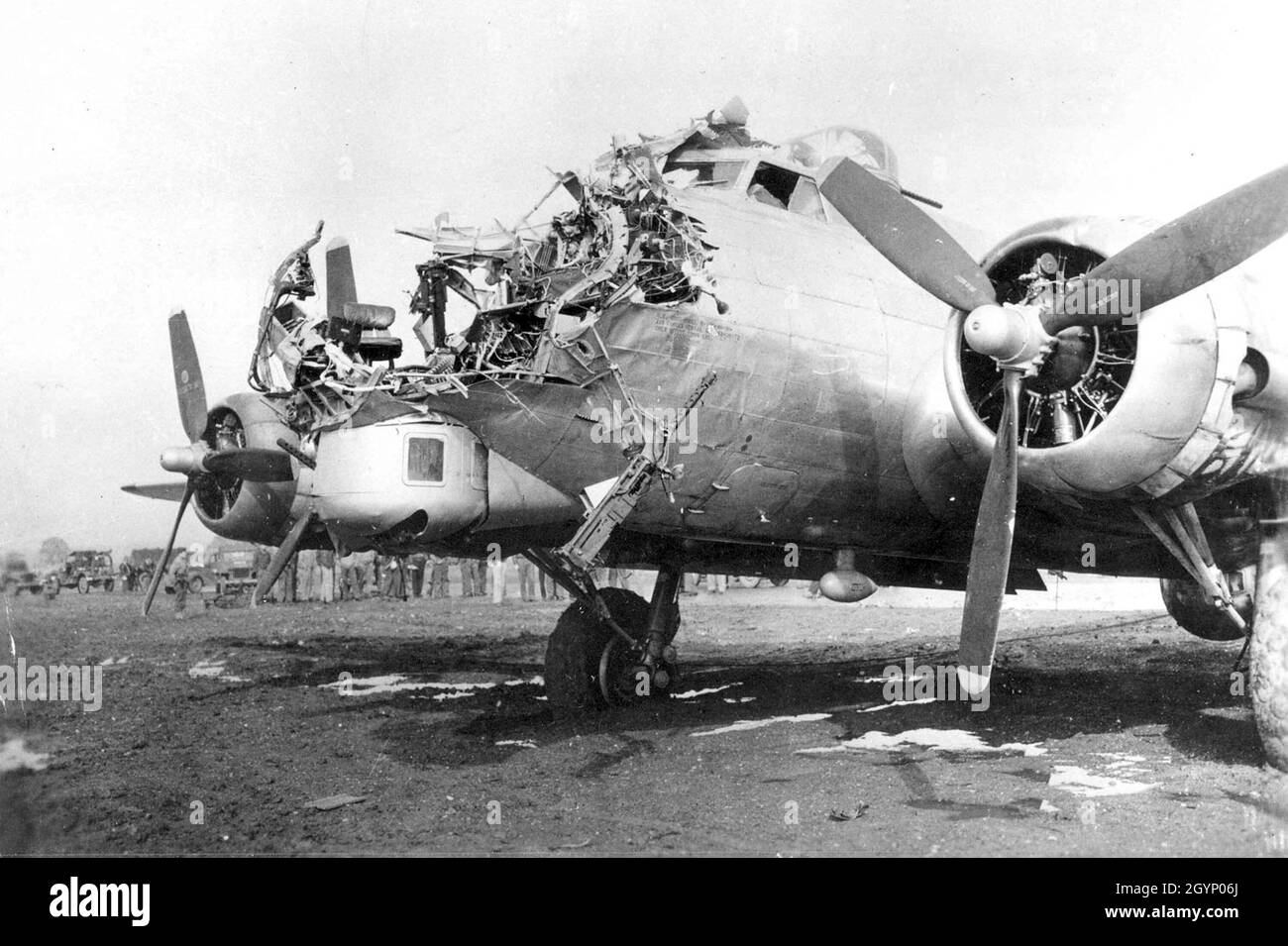 Flak damage completely destroyed the nose section of this Boeing B-17G, a 398th Bomb Group aircraft flown by 1Lt. Lawrence M. Delancey over Cologne, Germany. Stock Photo
