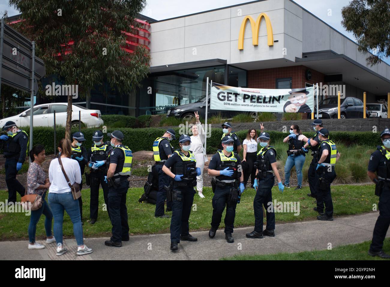 Melbourne, Australia, 9th October 2021. Police question anti-lockdown protesters after a roadside rally on Springvale Road. Credit: Jay Kogler/Alamy Live News Stock Photo