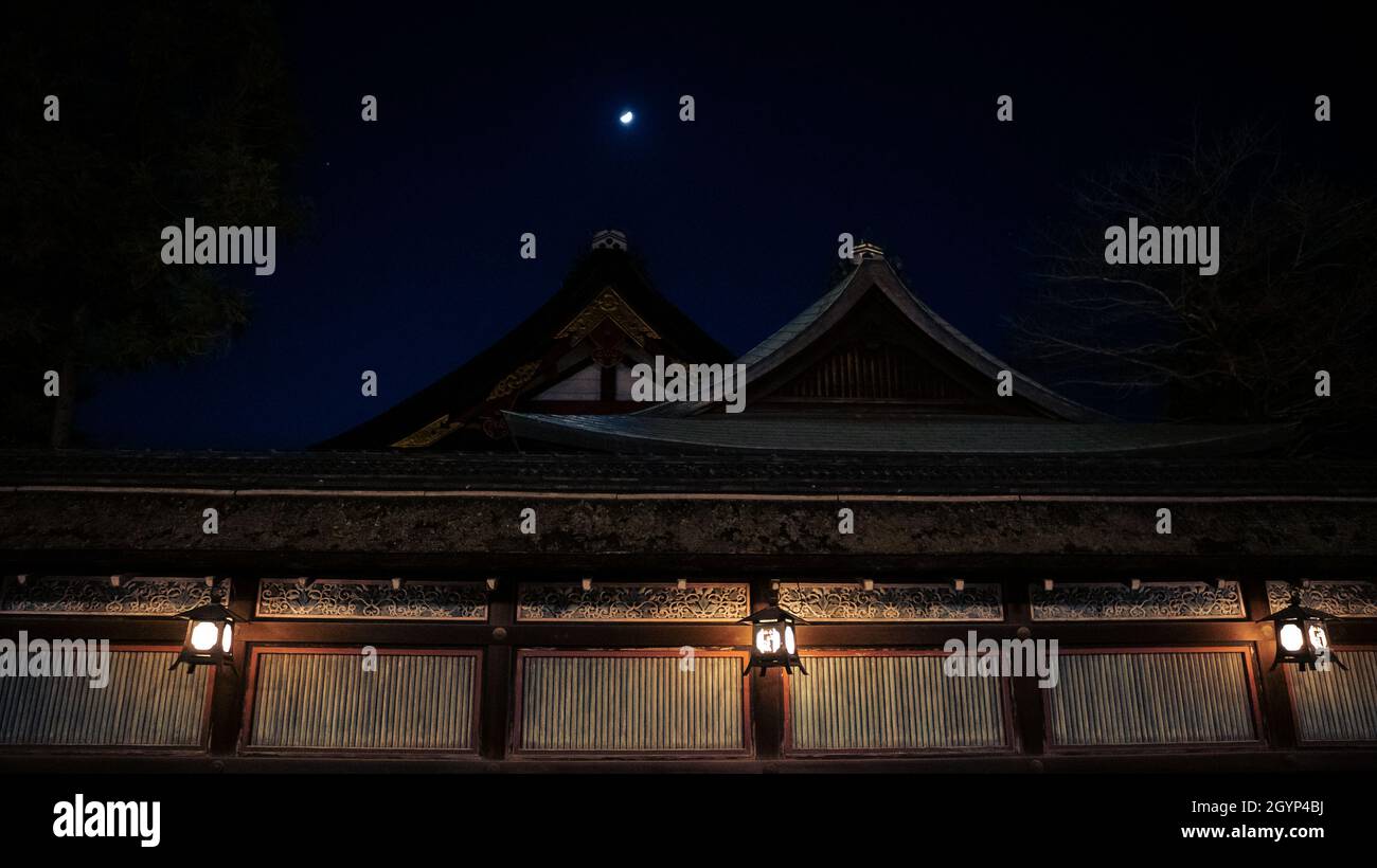 Beautiful rooftop house illuminated at night of Kyoto. Scenery of