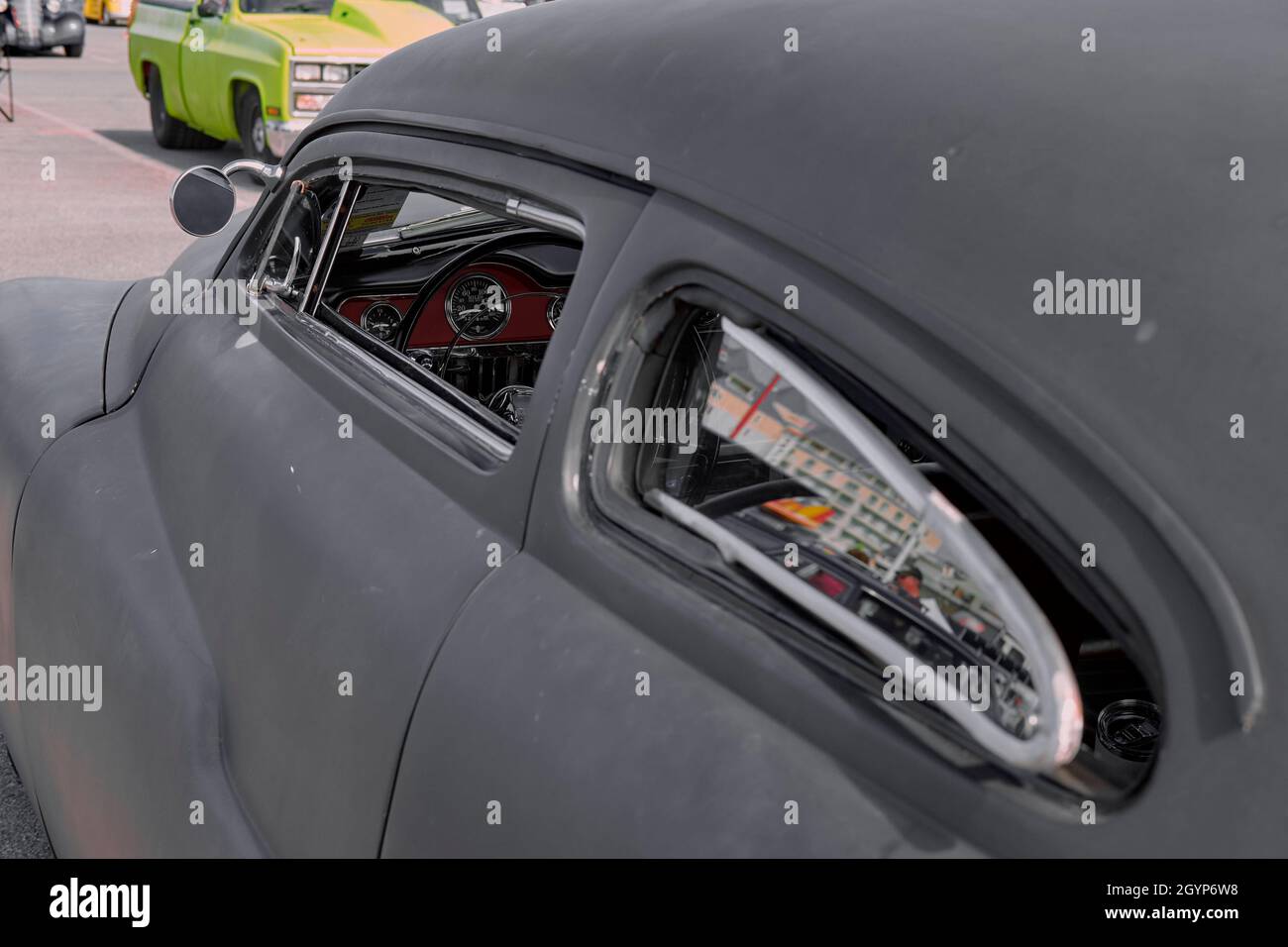 Custom black coupe on display at the 2021 Endless Summer Cruisin in Ocean City Maryland. Stock Photo