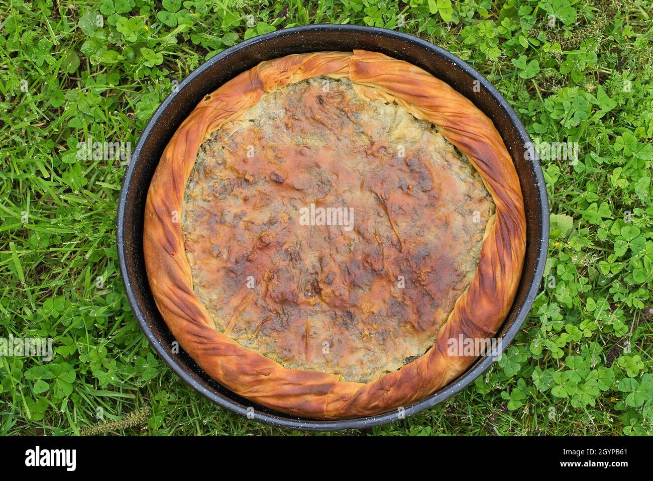 spinach pie, Greek traditional spanakopita, handmade pie baked in an