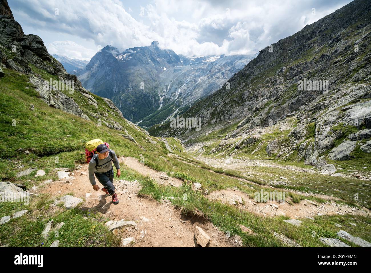 Hiking towards Mischabelhütte Alpine hut near Saas-Fee, Switzerland Stock Photo