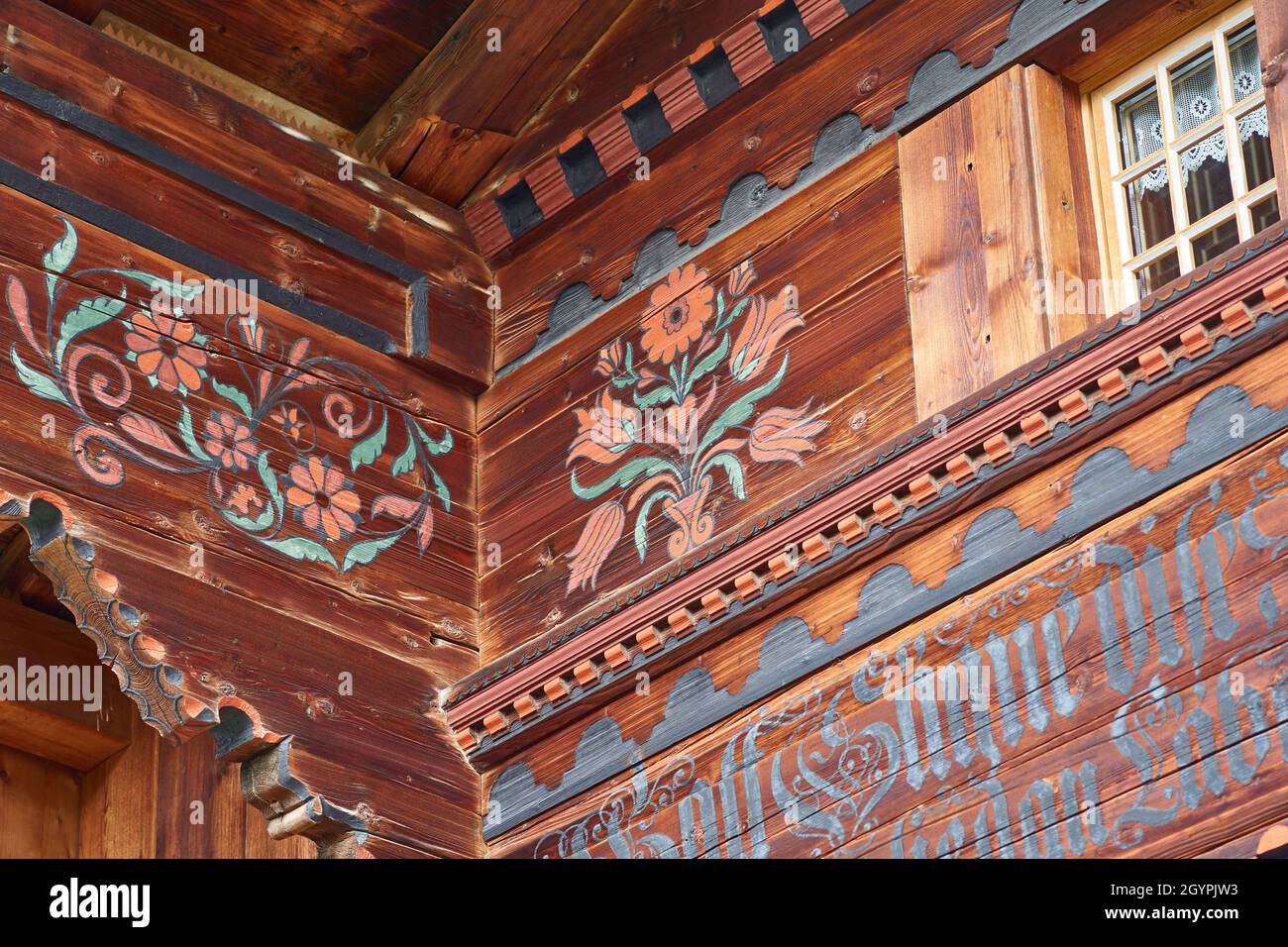 Closeup with handmade paintings on a Swiss chalet - Simmental, Berner Oberland, Switzerland Stock Photo