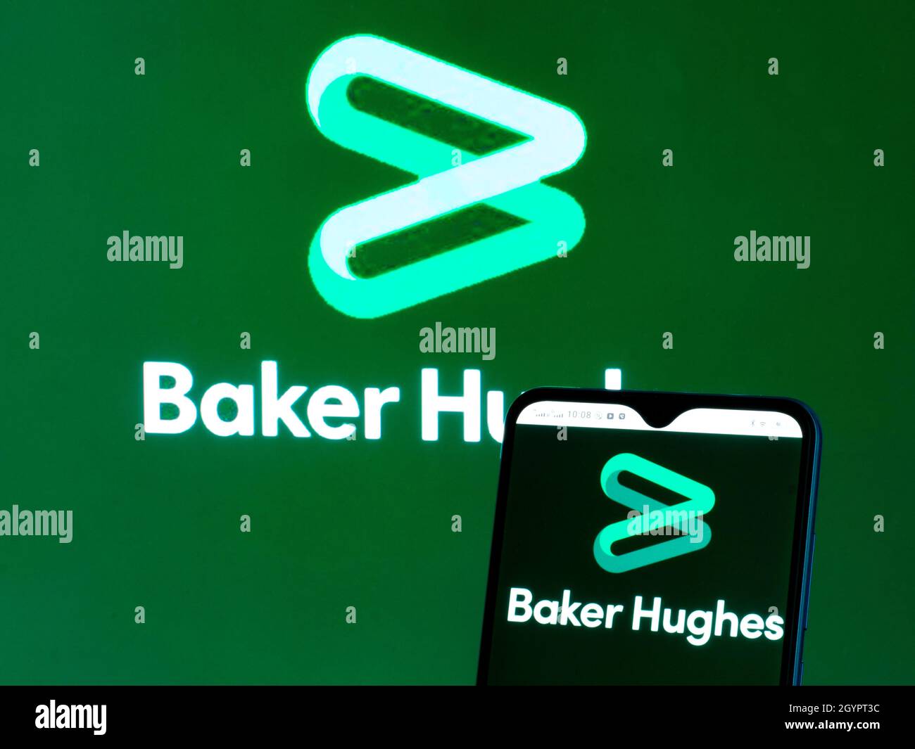 In this photo illustration Baker Hughes Company logo seen displayed on