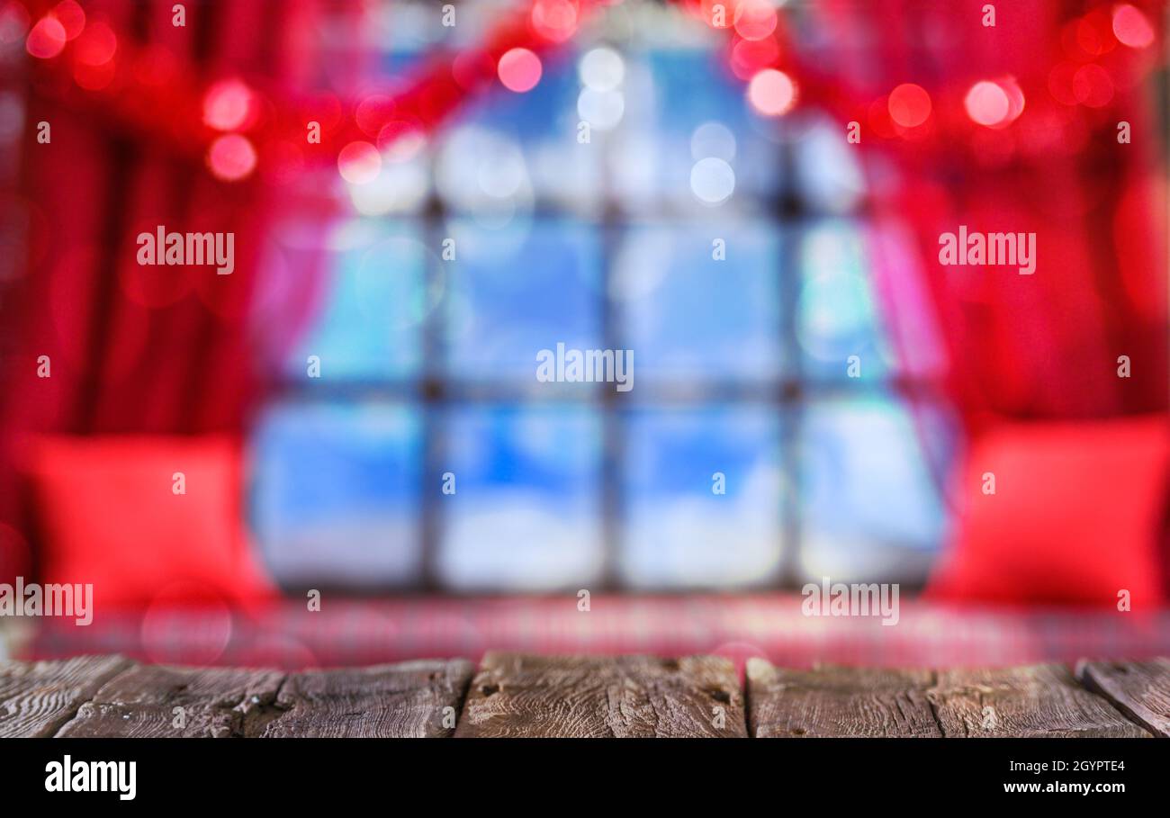 christmas cozy interior background with window sill illuminated with lights Stock Photo
