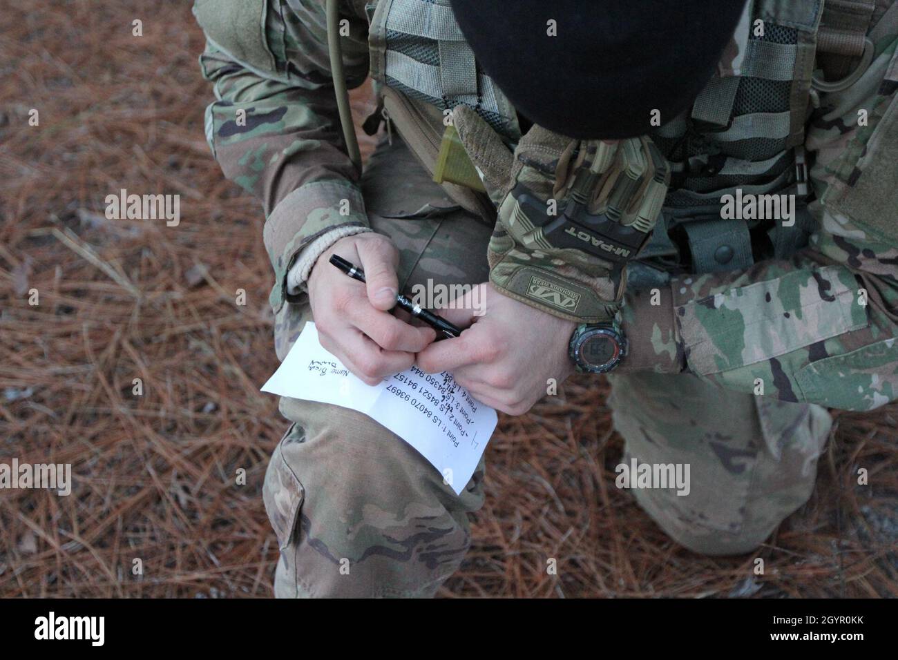 FORT GORDON, Ga. – Sgt. Daniel Brady, who hails from Erie, Pennsylvania and is a 35N, signals intelligence (SIGINT) analyst, representing B Company, 782nd Military Intelligence Battalion (Cyber), plots a point during the day land navigation course on January 22 at Range 6/7 to determine who will represent their battalions at the 780th MI Brigade (Cyber) 2020 Praetorian Best Warrior Competition. Stock Photo
