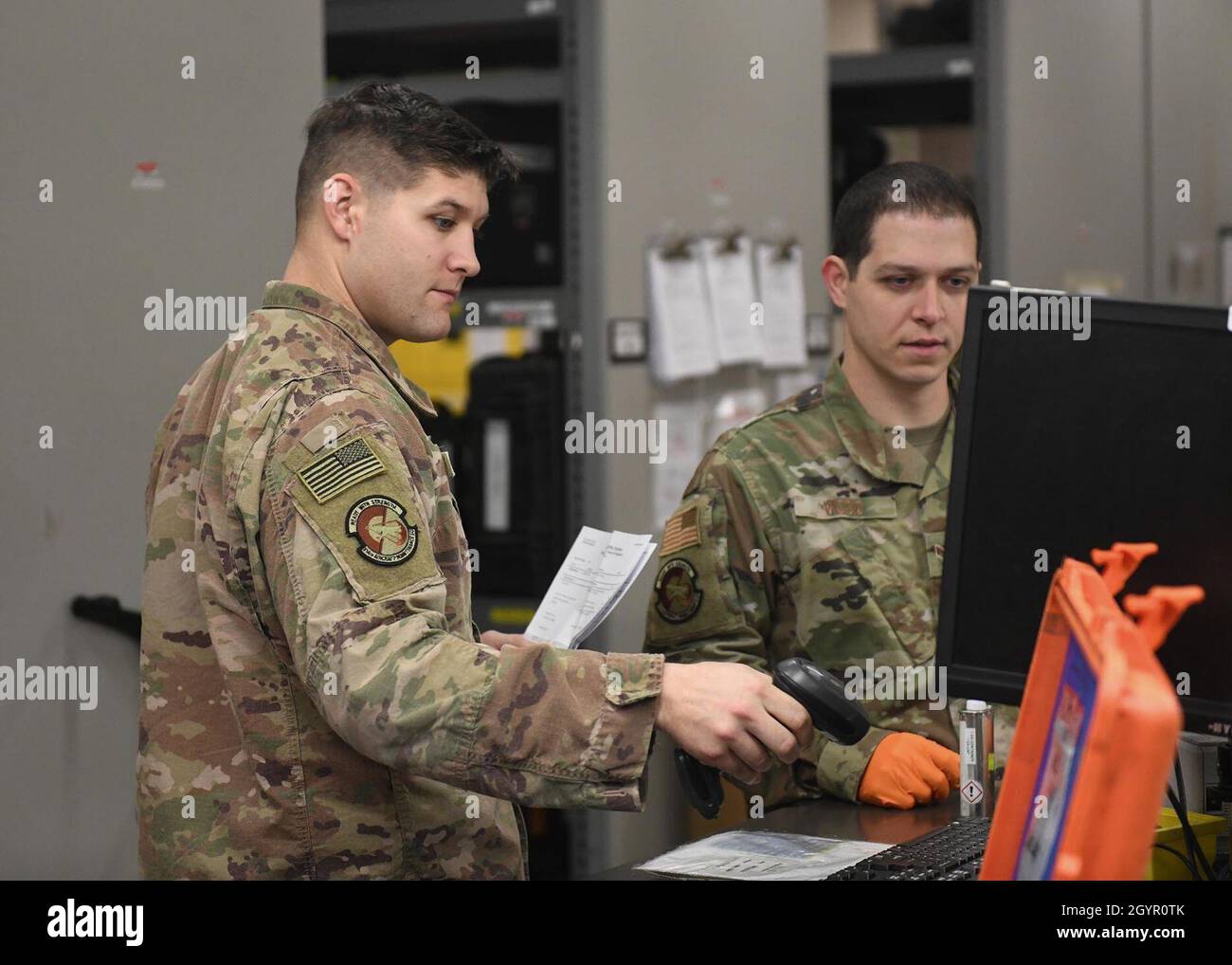 U.S. Air Force Staff Sgts. Ethan Flournoy and James Wood, 314th Aircraft Maintenance Squadron support technicians, scan a tool at Little Rock Air Force Base, Arkansas, Jan. 22, 2020. The 314th Aircraft Maintenance Squadron stood up its active-duty support section recently, which was considered a major milestone in its reconstitution plan, transitioning the squadron from civilian contractors to military personnel. (U.S. Air Force photo by Airman 1st Class Jayden Ford) Stock Photo