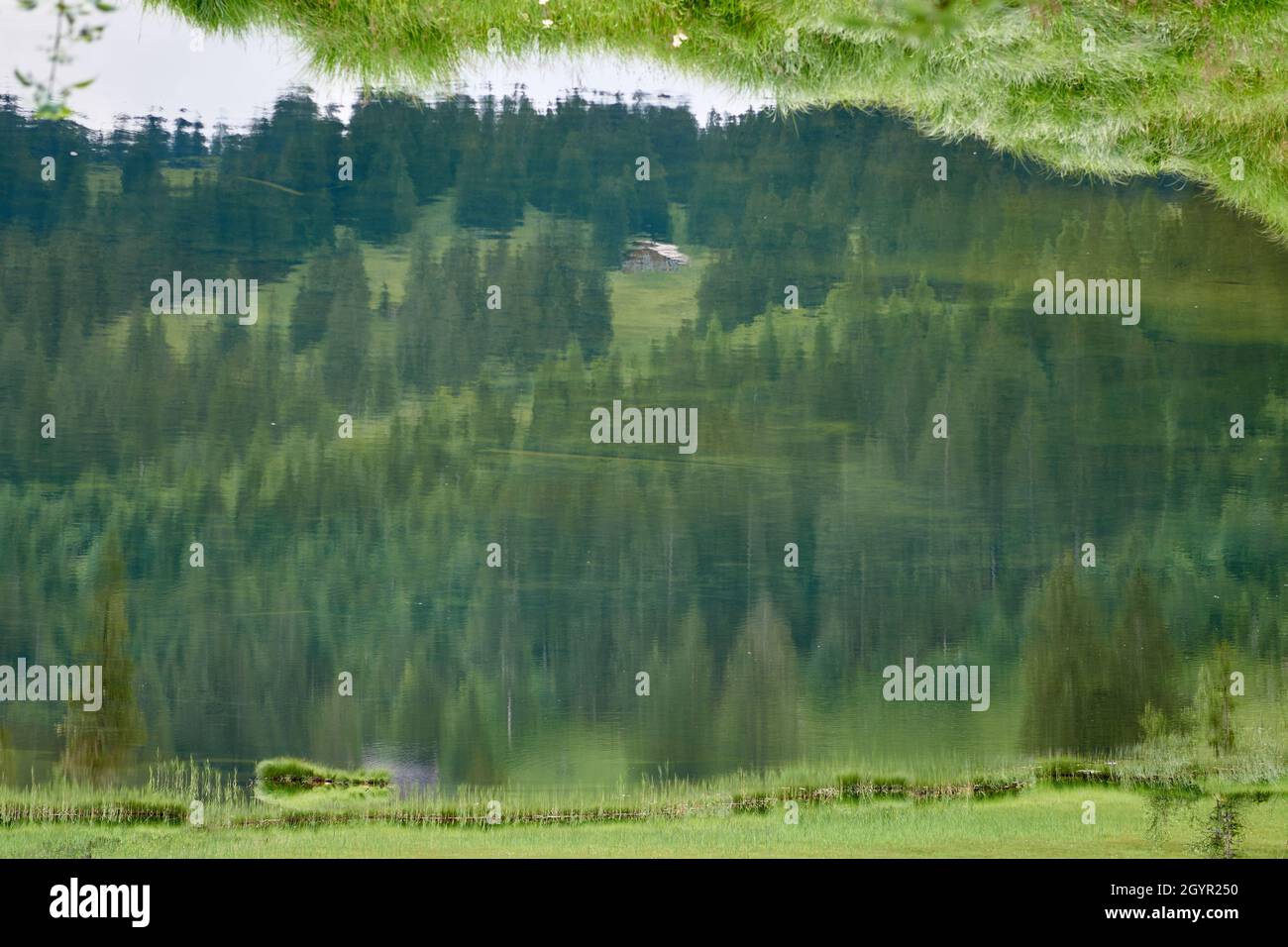 Abstract mountain lake reflections Stock Photo