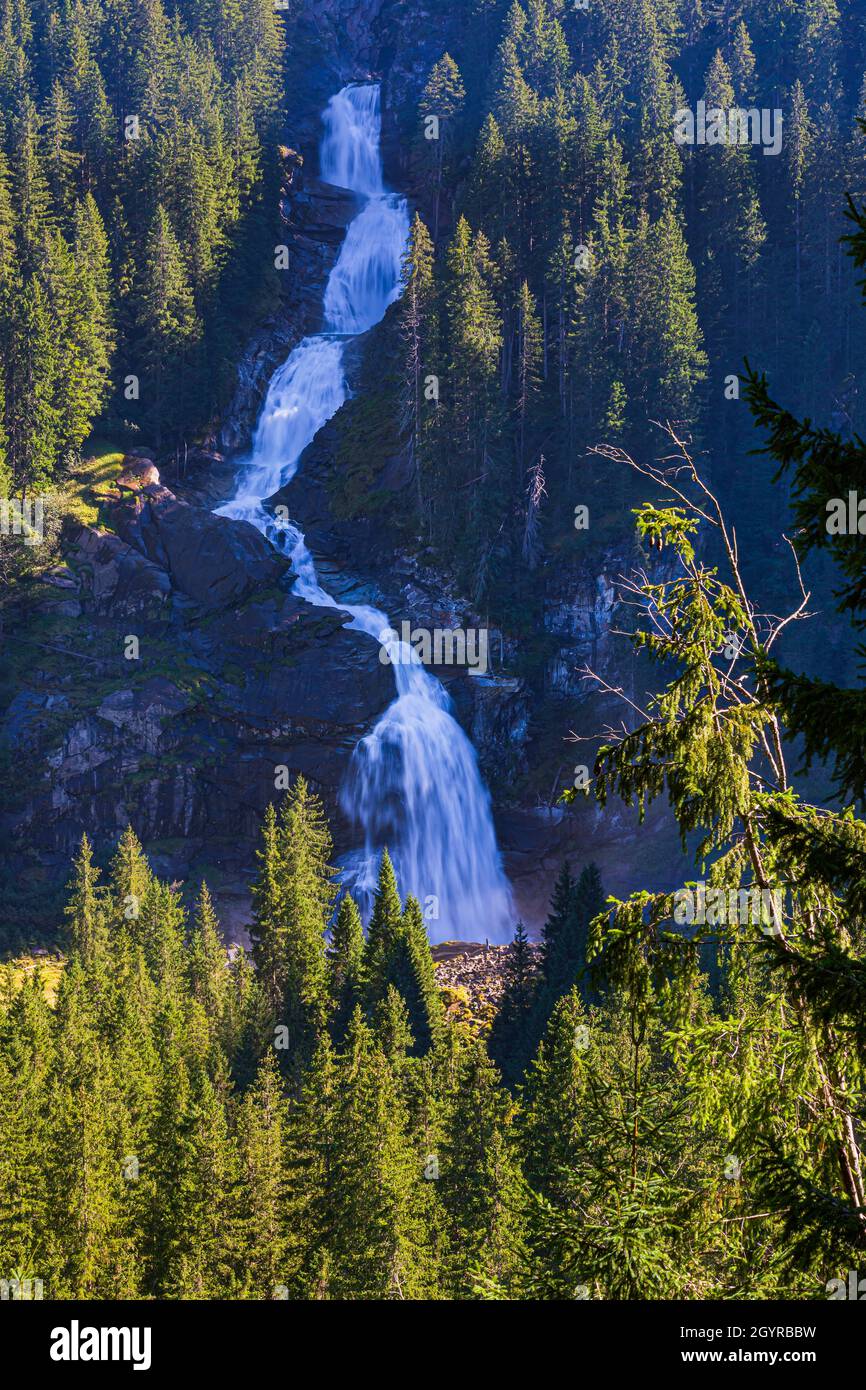 The Krimml Waterfalls (German: Krimmler Wasserfälle), with a total height of 380 metres (1,247 feet), are the highest waterfall in Austria. The falls Stock Photo