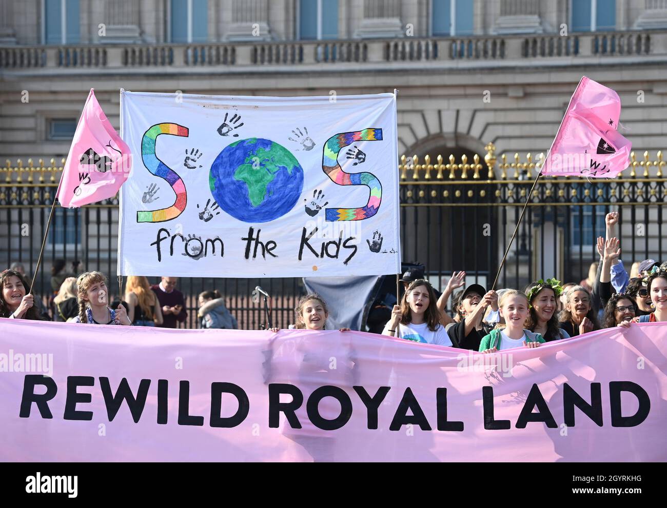 Environmental campaigners part in a march and delivery of a petition to the Buckingham Palace, demanding that the British royal family rewild their land, ahead of the COP26 climate summit due to take place in November, in London, Britain, October 9, 2021. REUTERS/Toby Melville Stock Photo