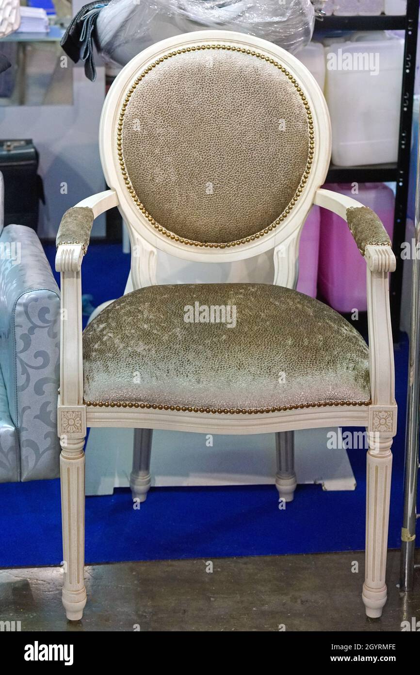 Classic style chair with gold material Stock Photo - Alamy