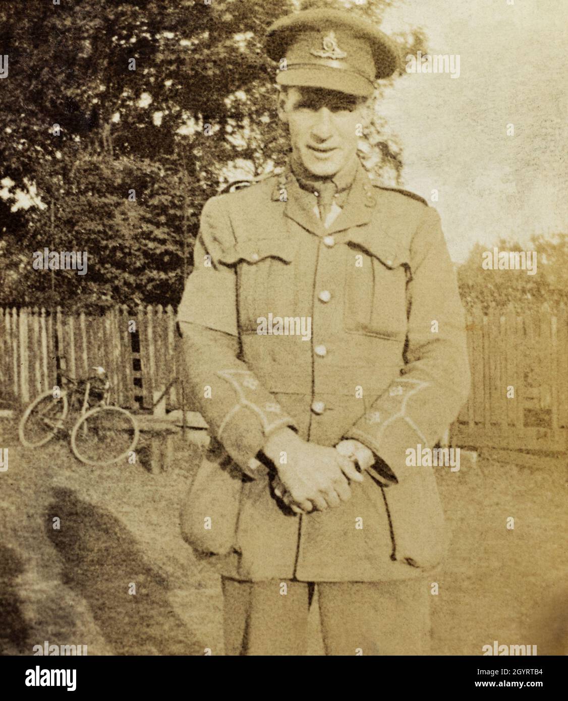 A First World War era portrait of a British army Officer, a Lieutenant in the Royal Artillery. He is wearing an armband on his right arm, possibly indicating he was wounded and convalescing in hospital. Stock Photo