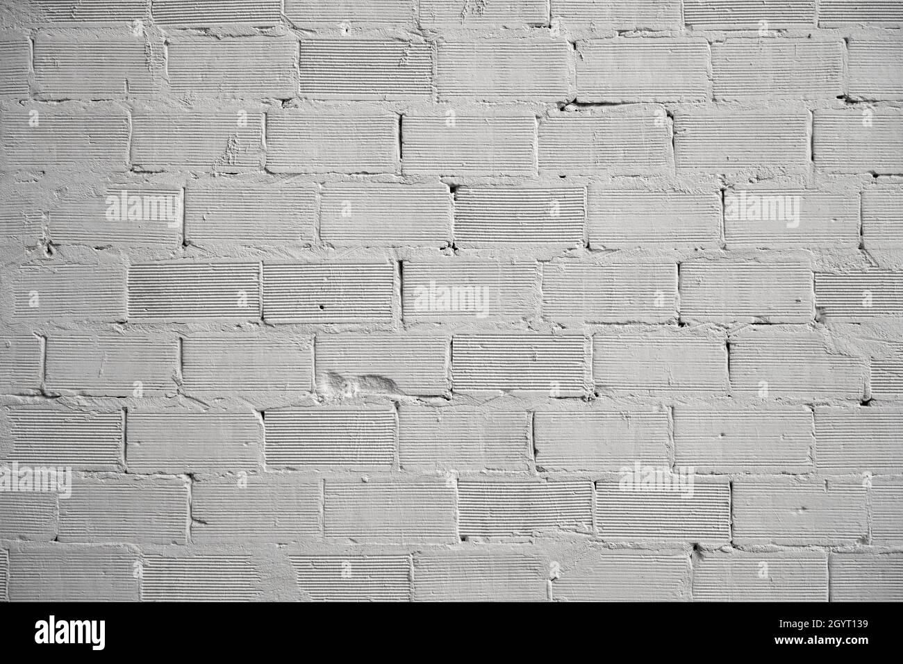 White plastered brick wall background with texture Stock Photo