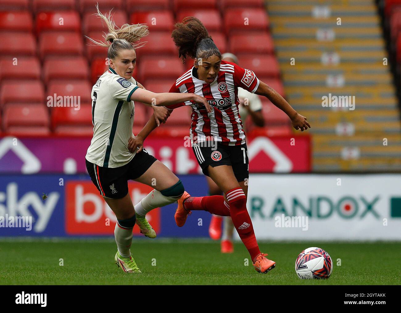 Sheffield, England, 9th October 2021.  Melissa Lawley of Liverpool challenges Jess Clarke of Sheffield United during the The FA Women's Championship match at Bramall Lane, Sheffield. Picture credit should read: Darren Staples / Sportimage Stock Photo