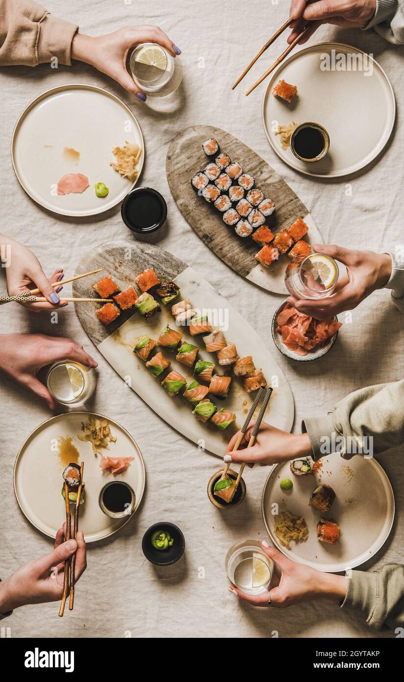 Lockdown home dinner with Japanese sushi from delivery takeaway service Stock Photo