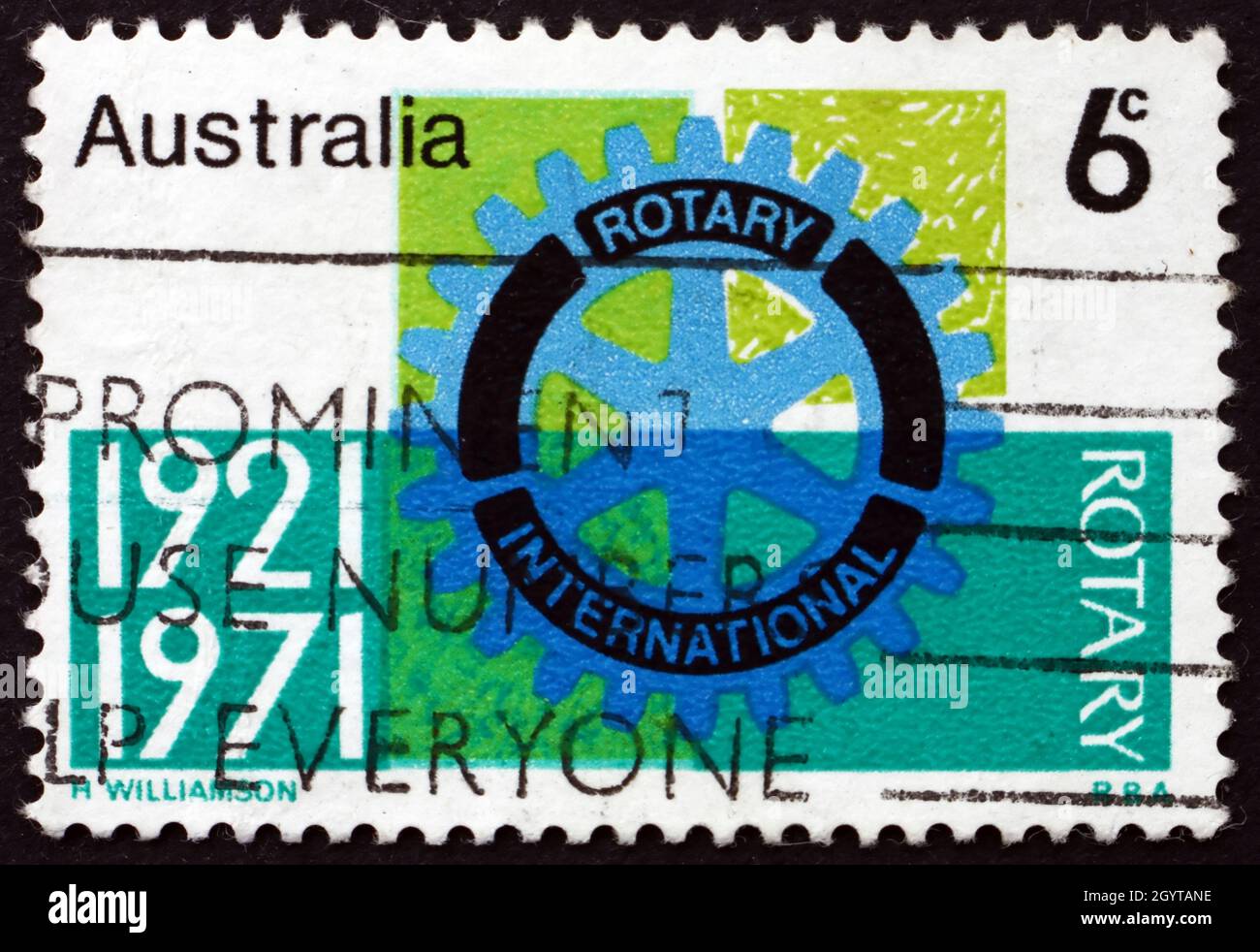 AUSTRALIA - CIRCA 1971: a stamp printed in Australia shows Rotary Emblem, First International Rotary Convention Held in Australia, Sydney, circa 1971 Stock Photo