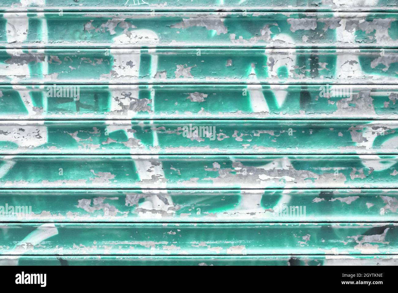 Turquoise metal shutter with peeling paint. Ideal use for background / wallpaper Stock Photo Alamy