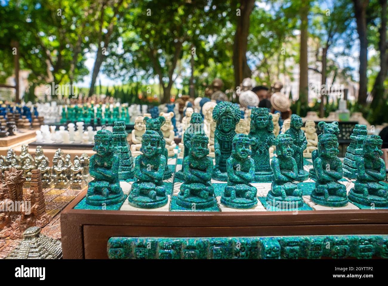 Traditional handcrafted Mexican souvenir statues for sale at marketplace Stock Photo