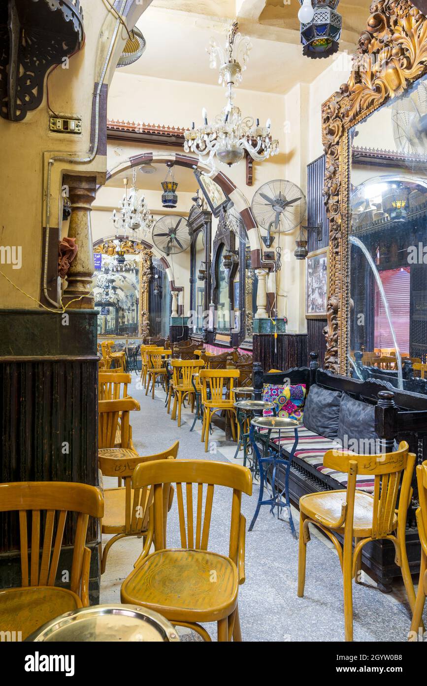 Cairo, Egypt- September 25 2021: Interior of old famous coffeehouse, El Fishawi, located in historic Mamluk era Khan al-Khalili famous bazaar and souq Stock Photo
