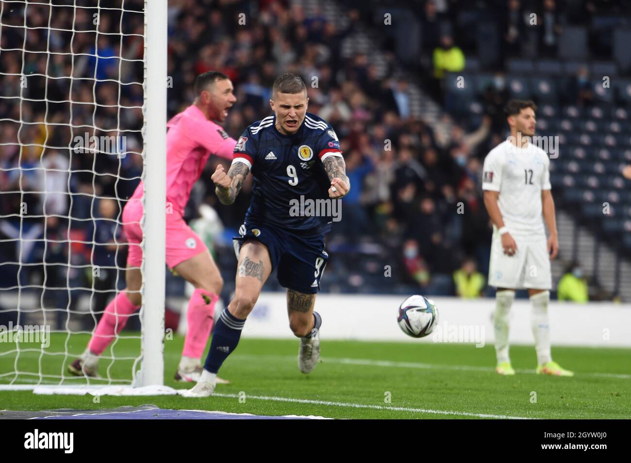 Glasgow, Scotland, 9th October 2021. Lyndon Dykes of Scotland equalises  during the FIFA World Cup qualifiers match at Hampden Park, Glasgow. Picture credit should read: Neil Hanna / Sportimage Stock Photo