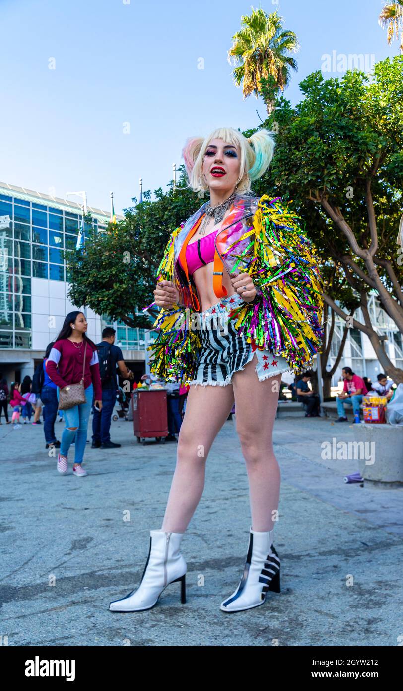 Attendee cosplayer portraying Harley Quinn in colorful costume at Comic Con in Los Angeles, CA, United States Stock Photo