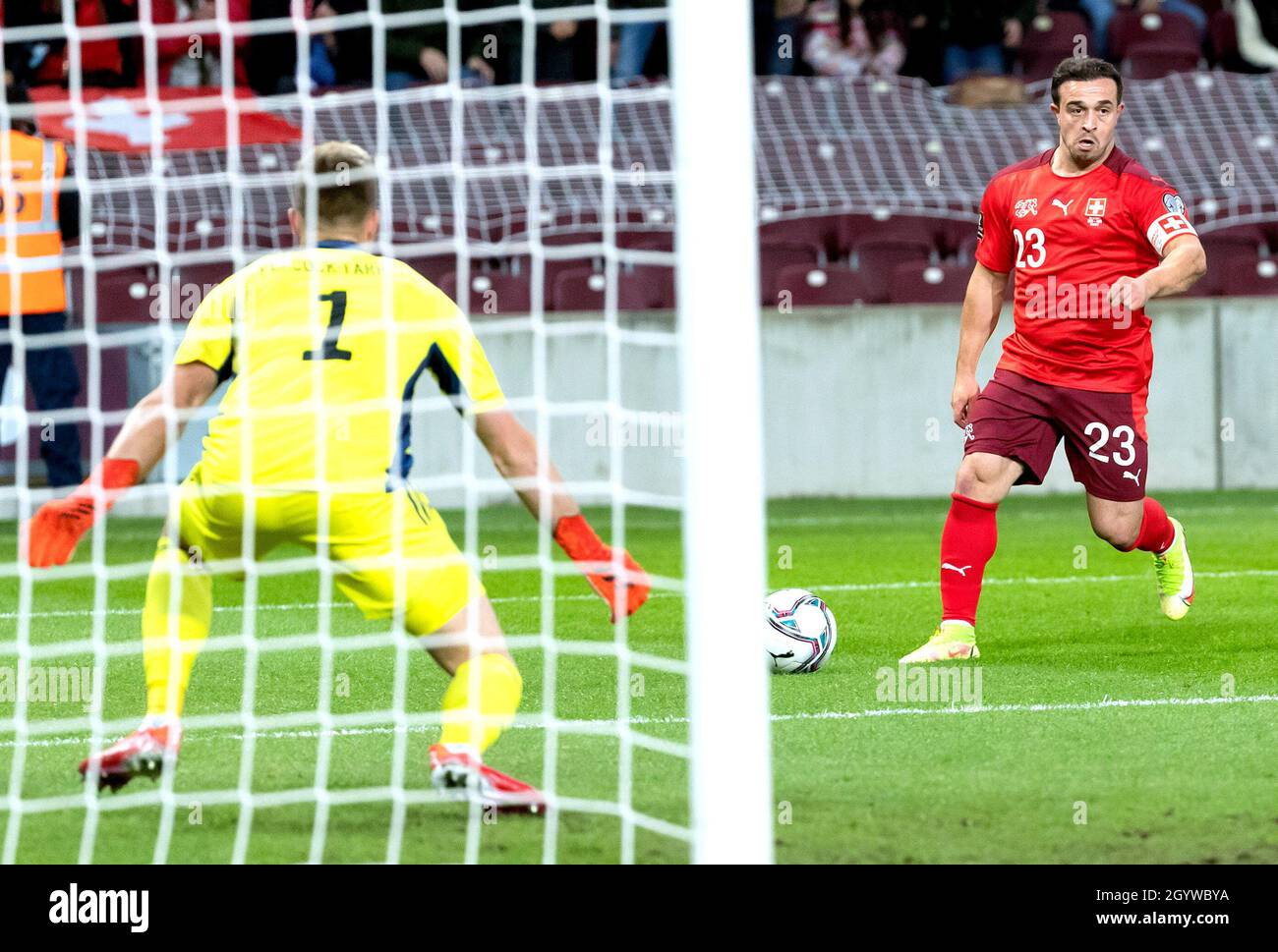 Switzerland's Xherdan Shaqiri (right) attempts a shot on goal during the FIFA World Cup Qualifying match at Stade de Geneve, Switzerland. Picture date: Saturday October 9, 2021. Stock Photo
