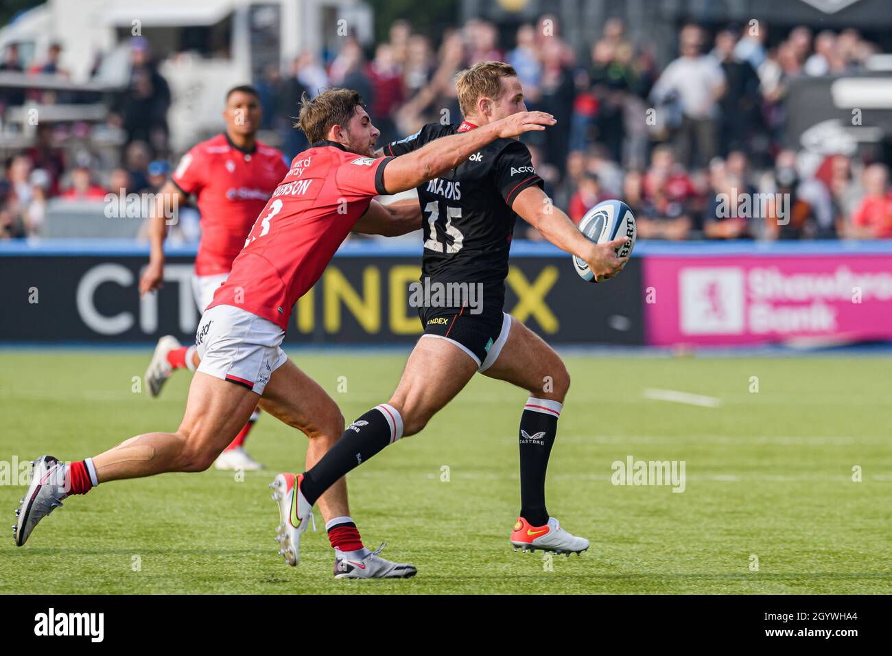 LONDON, UNITED KINGDOM. 09th, Oct 2021. Max Malins of Saracens (centre) is tackled during Gallagher Premiership Rugby Round 4 Match between Saracens vs Newcastle Falcons at StoneX Stadium on Saturday, 09 October 2021. LONDON ENGLAND.  Credit: Taka G Wu/Alamy Live News Stock Photo