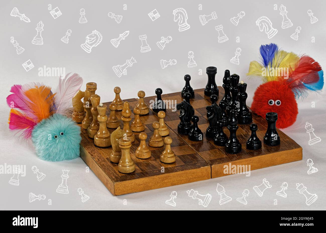 Photo furry friends, furry, fluffy, shaggy,Christmas,Christmas toys,chess, game, chess game Stock Photo