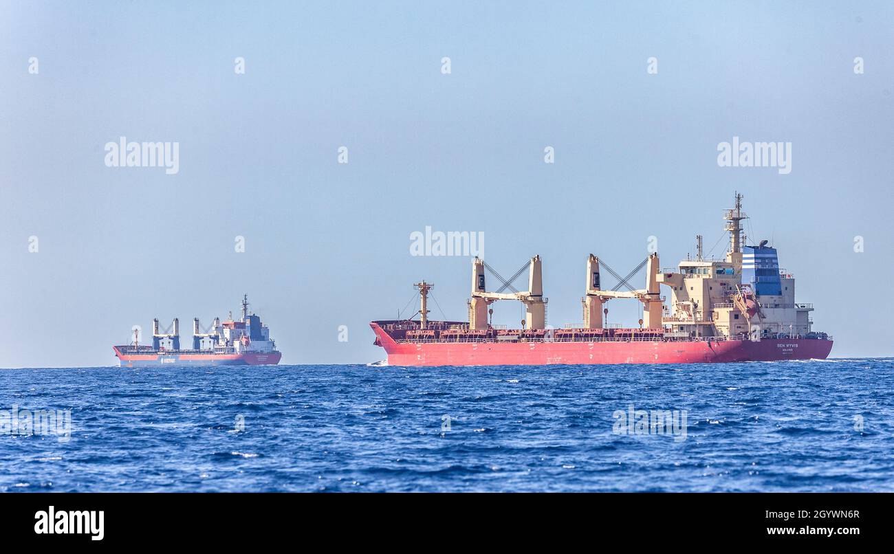Two bulk carriers, the Ben Wyvis and the the Hanze Gdansk, in the Straits of Gibraltar between Spain and Morocco. Stock Photo