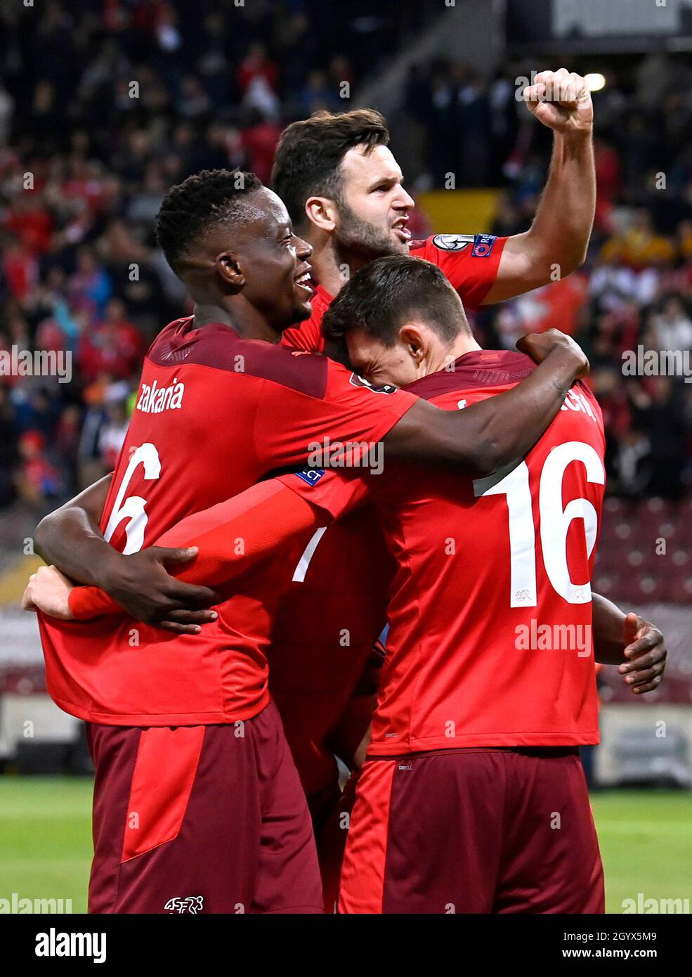 Switzerland's Christian Fassnacht (right) celebrates with his team-mates after scoring their side's second goal of the game during the FIFA World Cup Qualifying match at Stade de Geneve, Switzerland. Picture date: Saturday October 9, 2021. Stock Photo