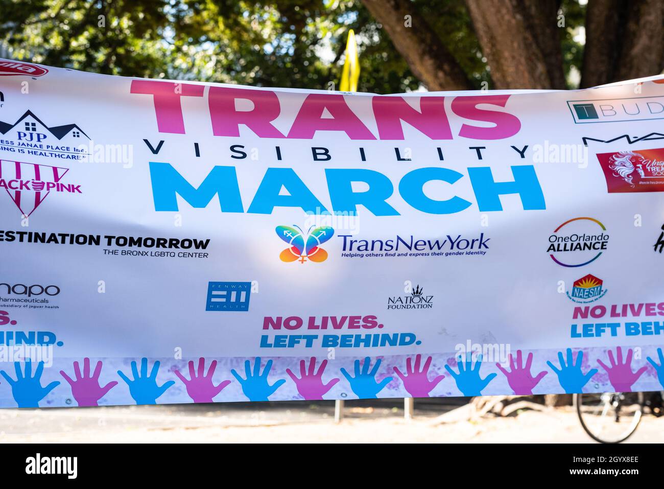 Photo of a banner at Crocker Park as part of the National Trans Visibility March Day event in Sacramento. Stock Photo