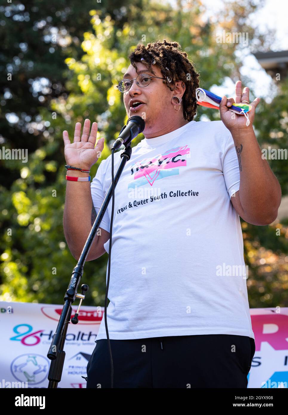 Judah Joslyn, Executive Director of the Trans  Queer Youth Collective speaks at Crocker Park as part of National Trans Visibility March Day. Stock Photo