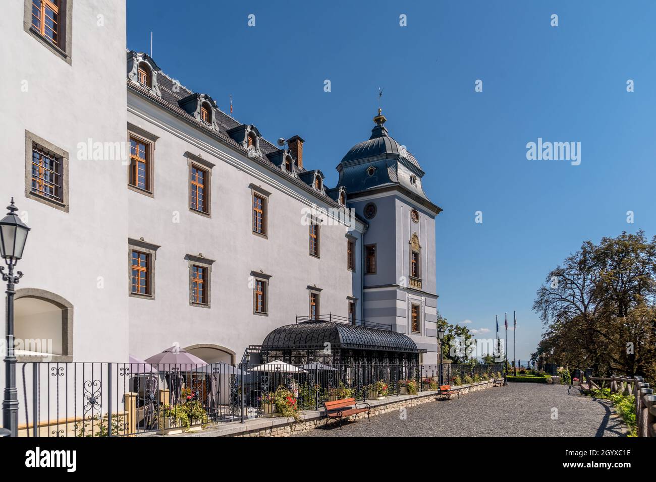 Aerial view of Halic castle in Slovakia, mansion turned luxury five star hotel with manicured garden brick driveway with pattern Stock Photo