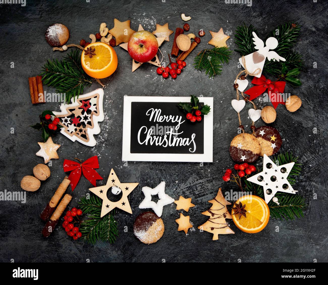 Christmas composition on dark background. Festive background. Top view, flat lay Stock Photo