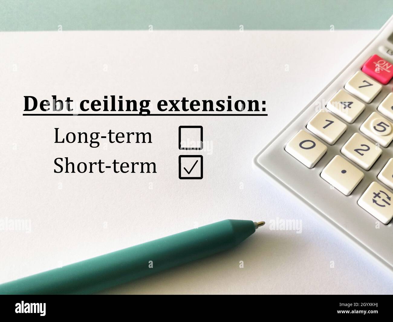 One person is answering question about economy. The person chooses short term debt ceiling extension. Stock Photo