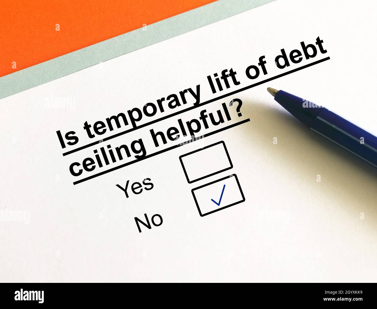 One person is answering question about economy.The person thinks the temporary lift of debt ceiling is not helpful. Stock Photo