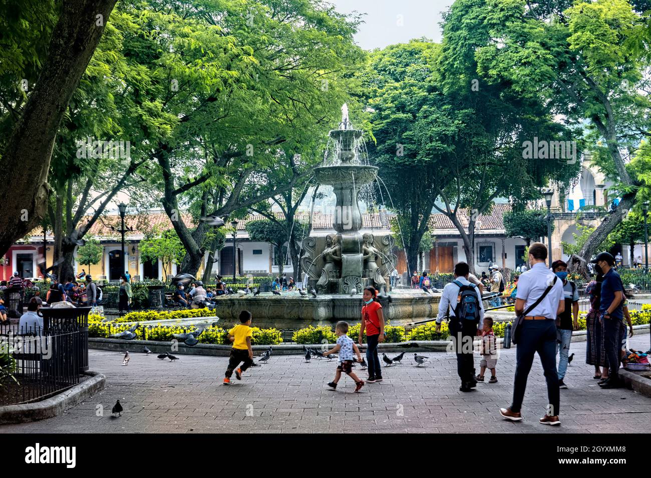 Scenes from the Plaza Mayor (Parque Central) Antigua, Guatemala, Stock Photo