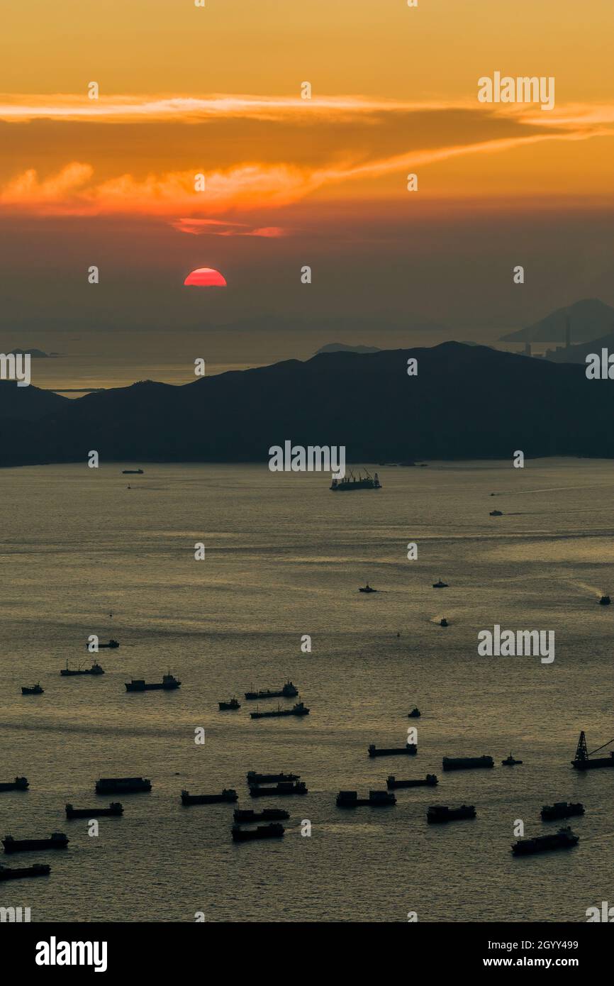 Sunset over Lantau Island and  the Pearl River estuary seen from Level 106 of the ICC in West Kowloon, Hong Kong Stock Photo