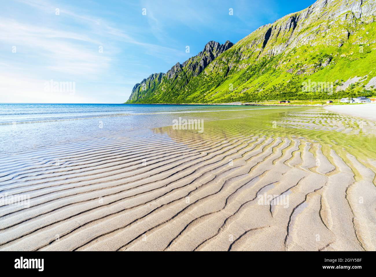 Scenic view of mountains from the white sand of Ersfjord beach in summer, Senja, Troms county, Norway Stock Photo