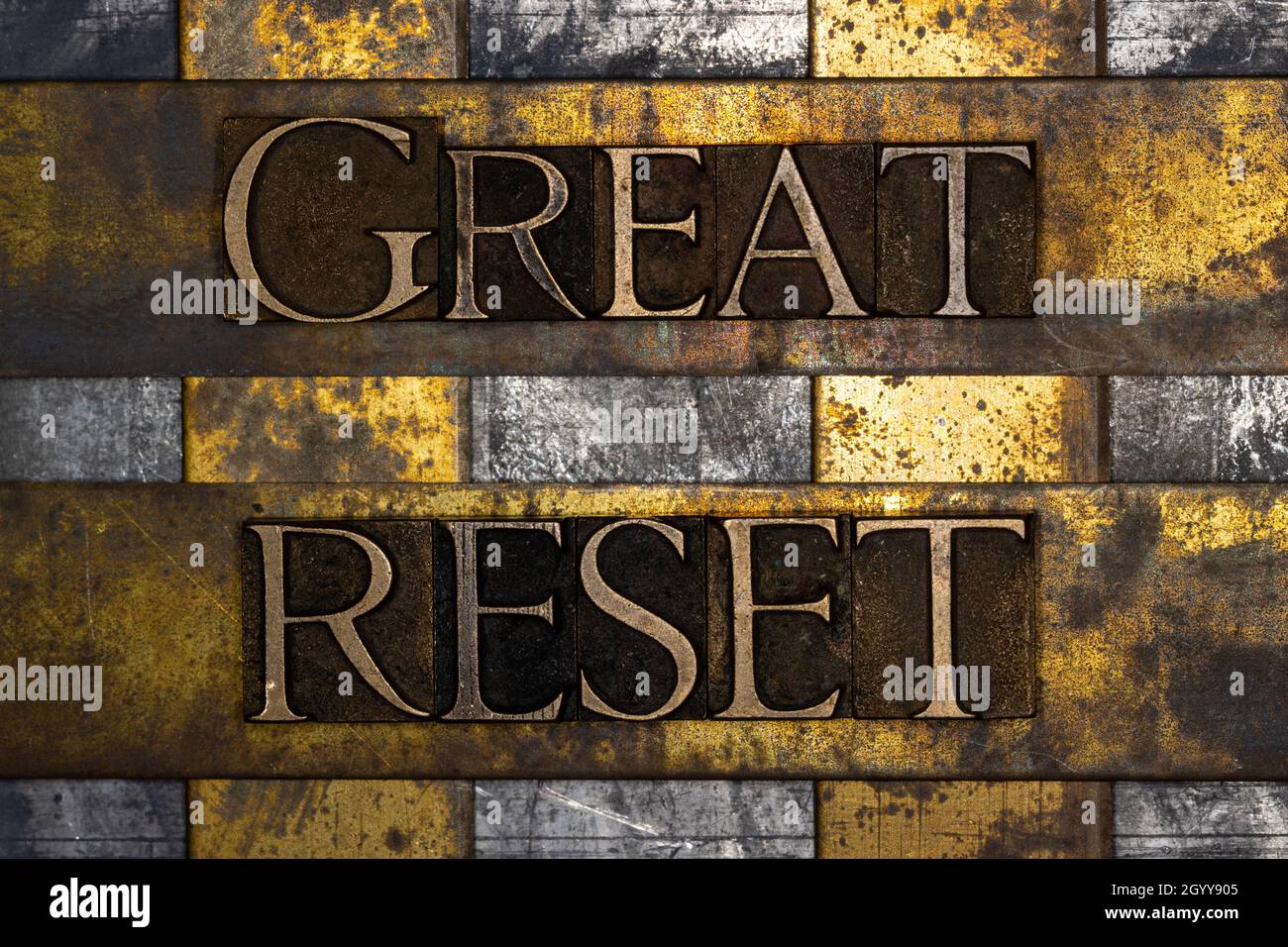Great Reset text on textured grunge copper and vintage gold background Stock Photo