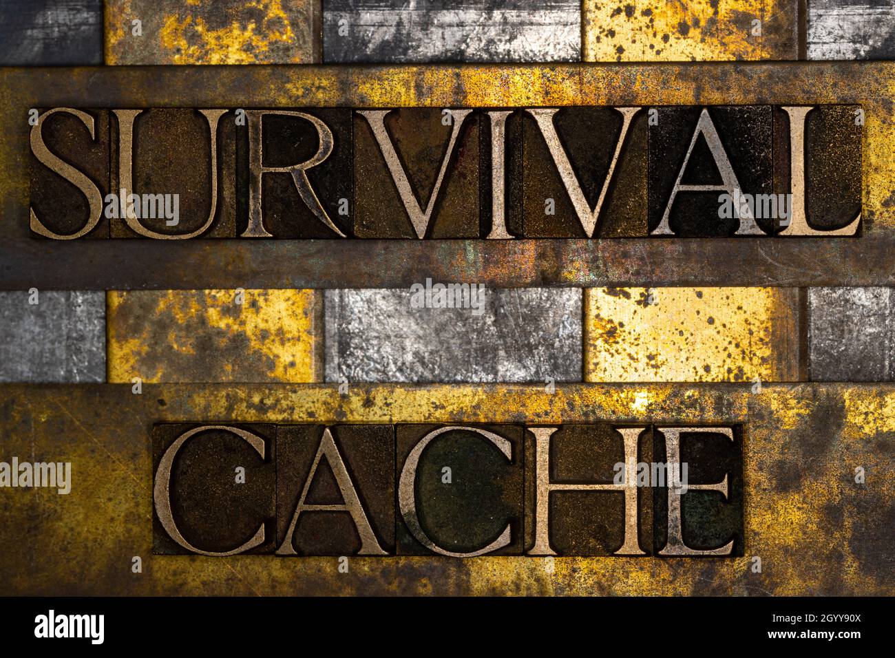 Survival Cache text on textured grunge copper and vintage gold background Stock Photo