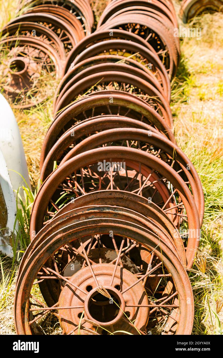 vintage American rusty steel wheels in junkyard Stock Photo Alamy
