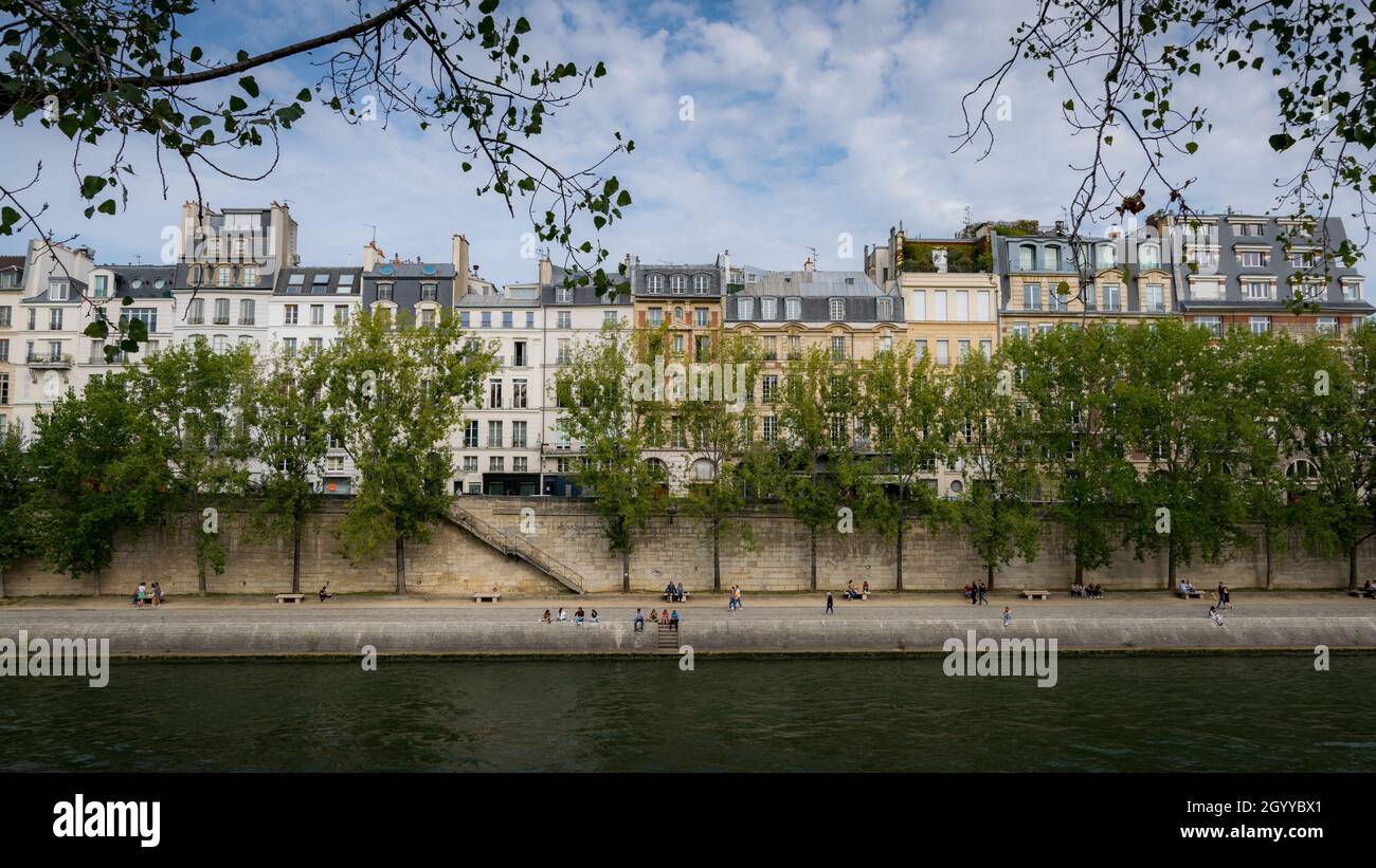 Parisian houses in a row in front of the river Seine Stock Photo