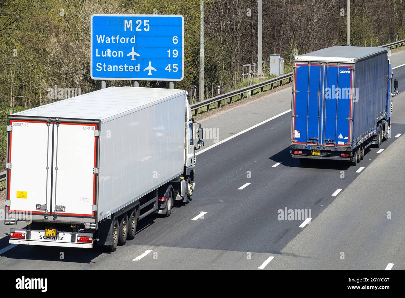 Lorries and trucks on M25 motorway in London England United Kingdom UK Stock Photo