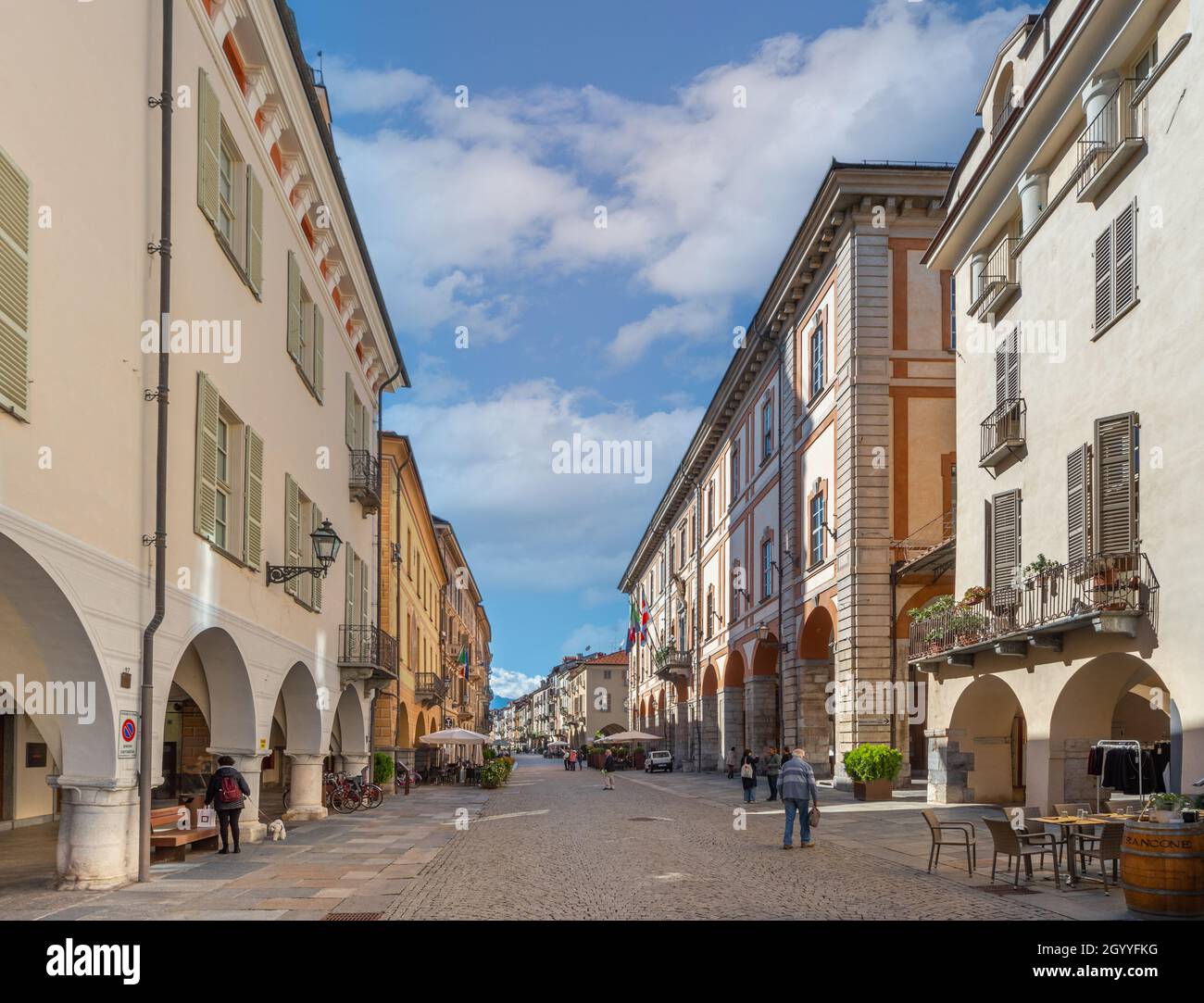 Cuneo, Piedmont, Italy - October 6, 2021: Via Roma with Town Hall on the right, historic buildings with the typical arcades (portici di Cuneo) Stock Photo