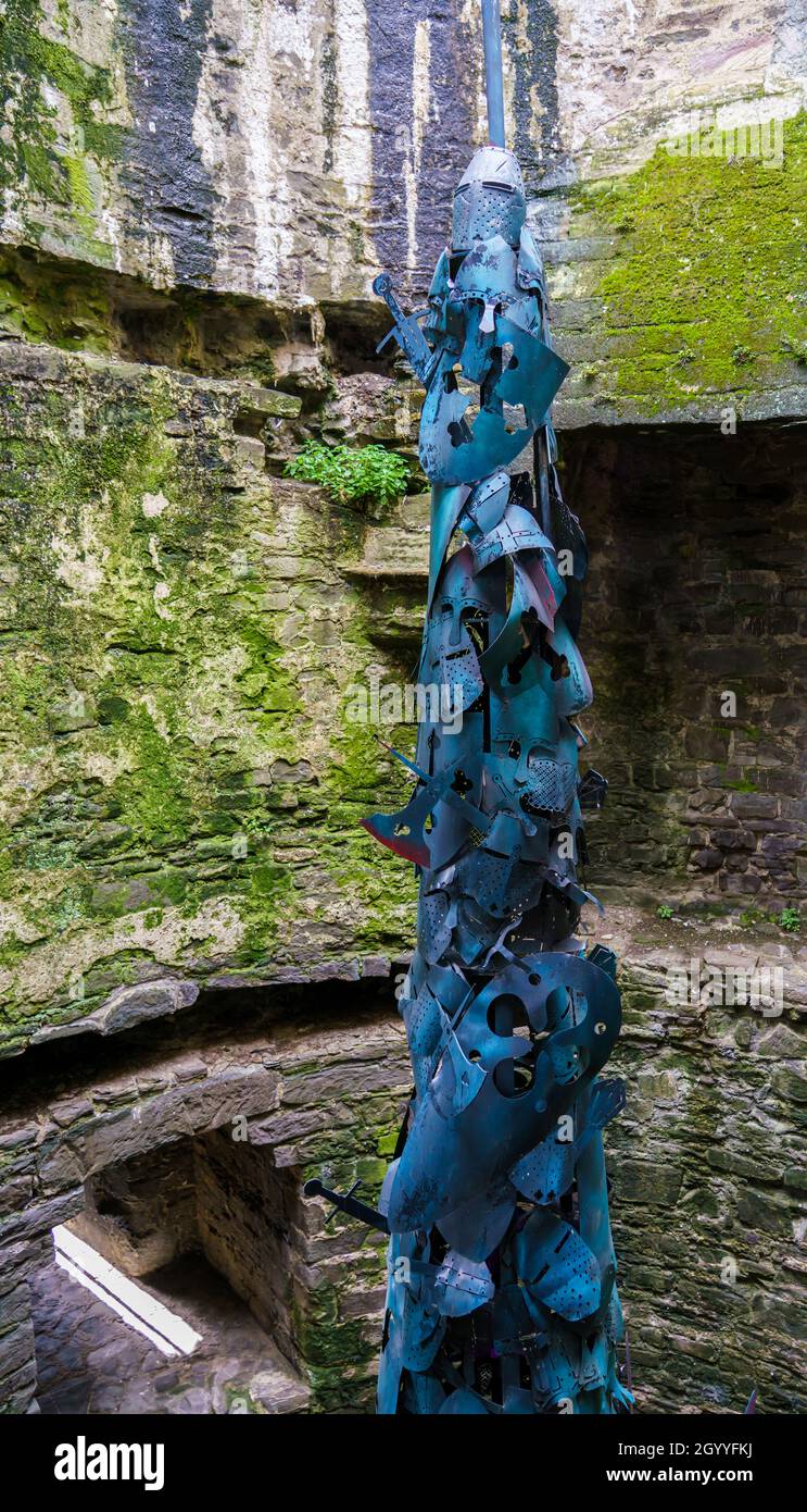 a blue metal statue representing medieval knights inside of Conwy castle, North Wales Stock Photo