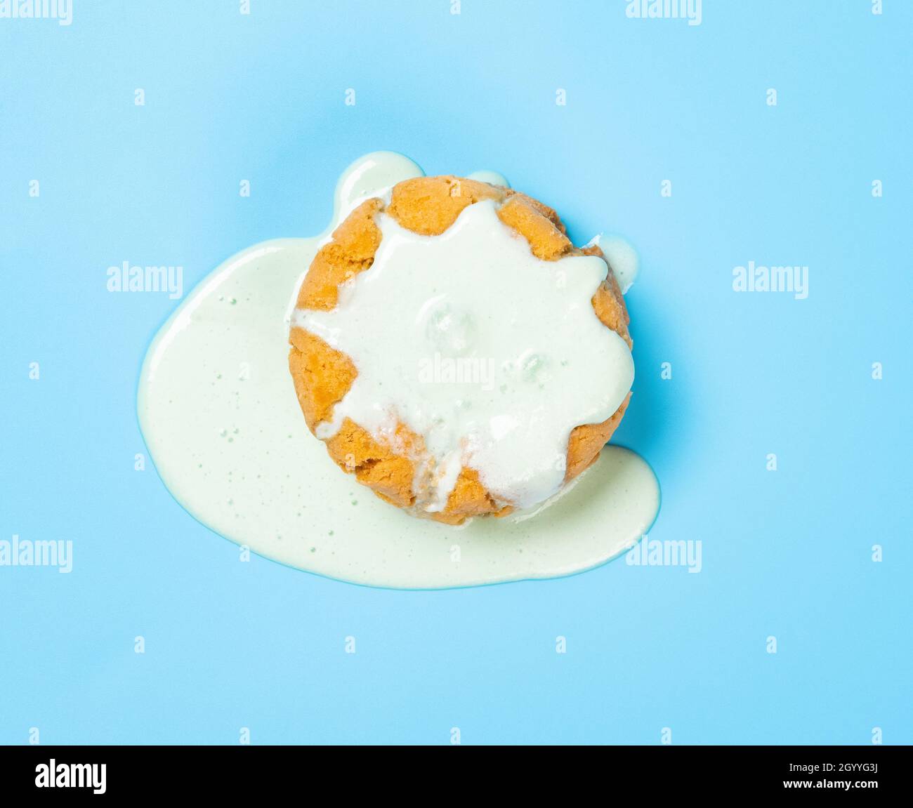 top view hami melon flavor ice cream melted on top of cookies Stock