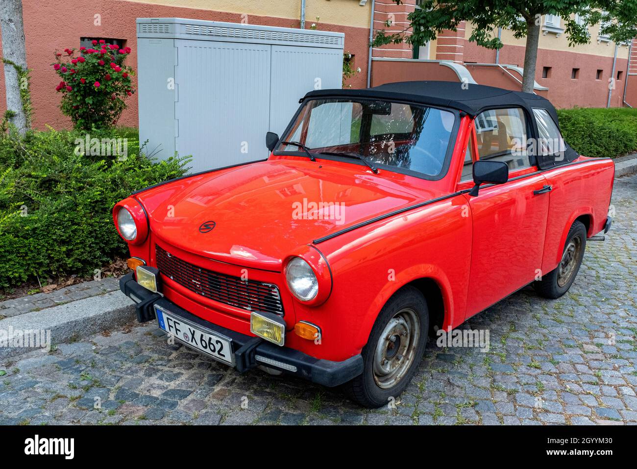 Frankfurt Oder, Germany. Totally refurbished DDR / GDR / East-German Trabi Cabriolet Car with red paint job. Trabi's are now a culture thing. Stock Photo